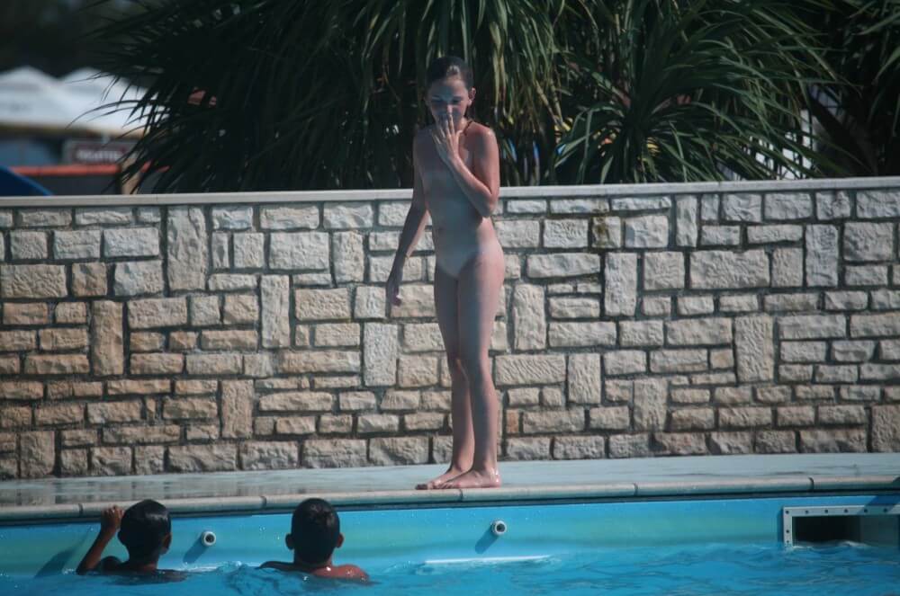Naturist Pool-Side Singles photos - The Cult of Nudity Is Open to All