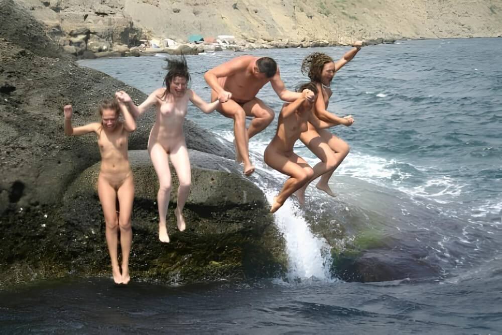 Mens and girls nudists on a beach - Naturism teaches you to accept yourself and others