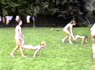 A nudist gathering at the stadium and sports - Through naturism, people seek the opportunity to feel free and in harmony