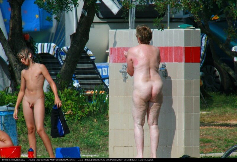 Covered in Towel Nudists-Boardwalk Biking - Clothing is a barrier for a nudist