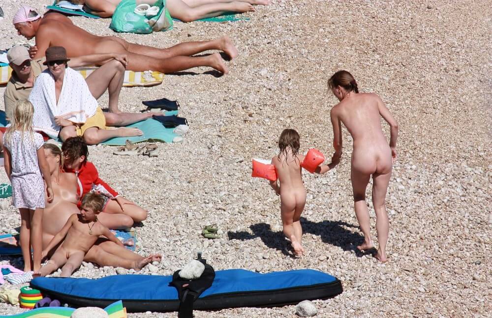 Orange Floaty Safety First Naturist pics - Lightness and ease as the main traits of naturists
